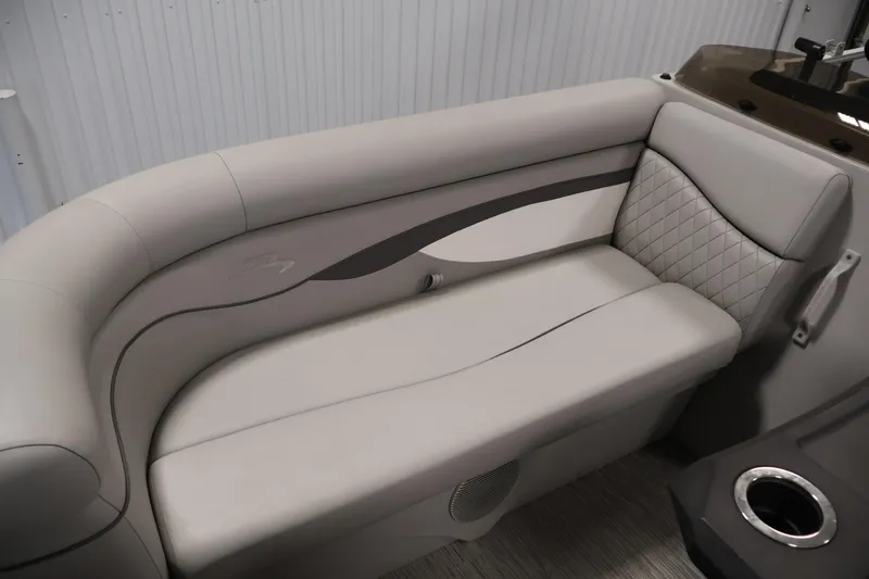 Slide: The Image of 2023 Bennington SV 22 Quad Bench with elegant gray upholstery and quilted detailing. - 13