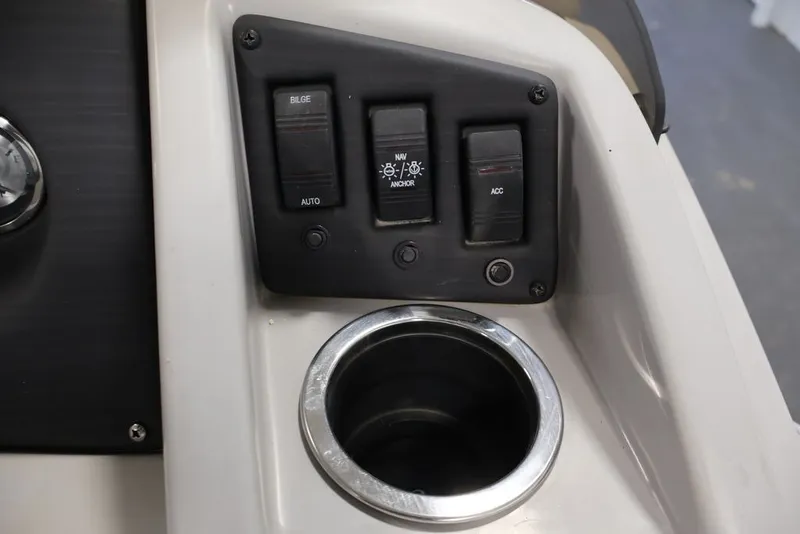Slide: The Image of Control panel of 2023 Bennington SV 22 Quad Bench with cup holder. - 22