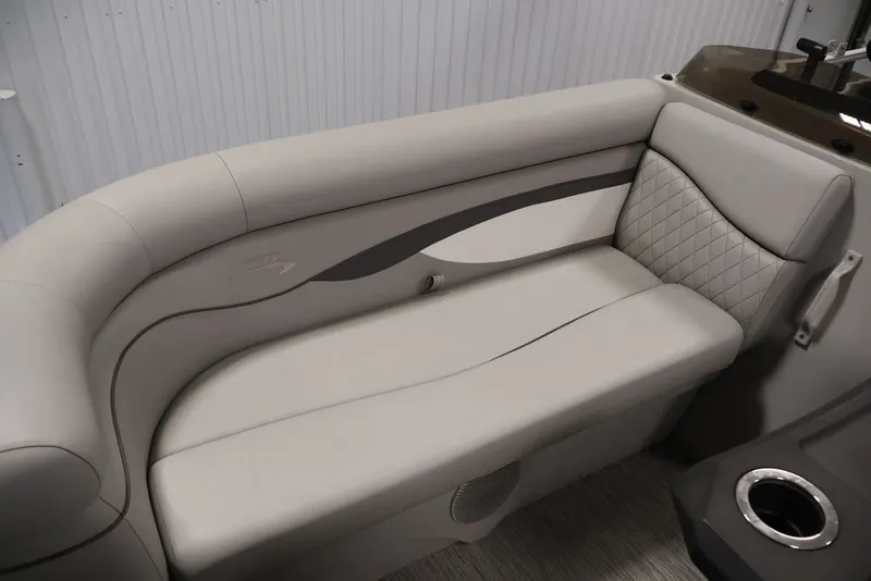 Slide: The Image of 2023 Bennington SV 22 Quad Bench with elegant gray upholstery and quilted design. - 11