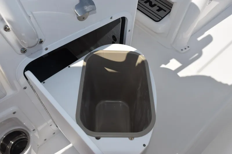Slide: The Image of Storage compartment on 2026 Sea Hunt Ultra 245 SE boat, featuring sleek design and functionality. - 21
