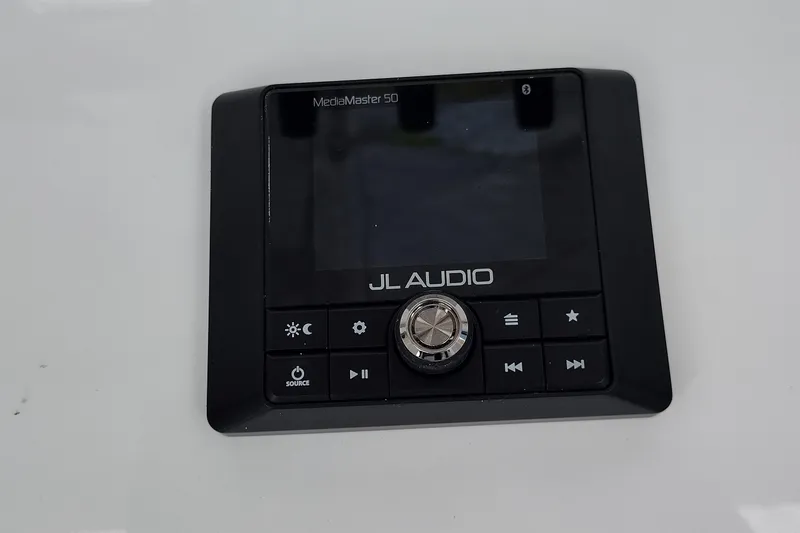 Slide: The Image of JL Audio MediaMaster 50 control panel on 2024 Wellcraft 223 Fisherman boat. - 34