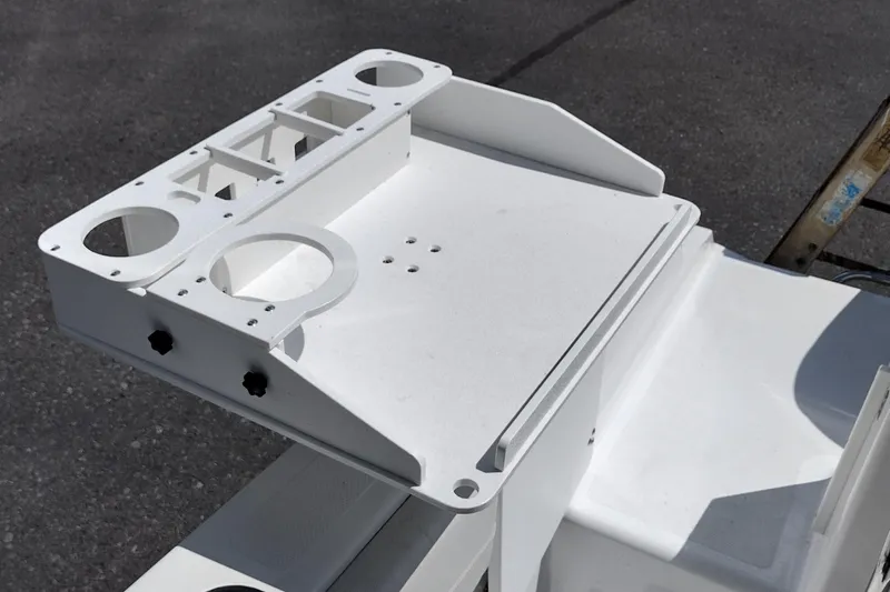 Slide: The Image of 2024 Wellcraft 223 Fisherman boat component, featuring a white mounting bracket on deck. - 24