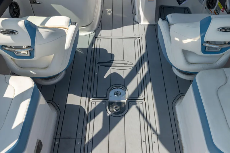Slide: The Image of Interior of 2026 Chaparral 250 OSX boat with sleek seating and modern design. - 18