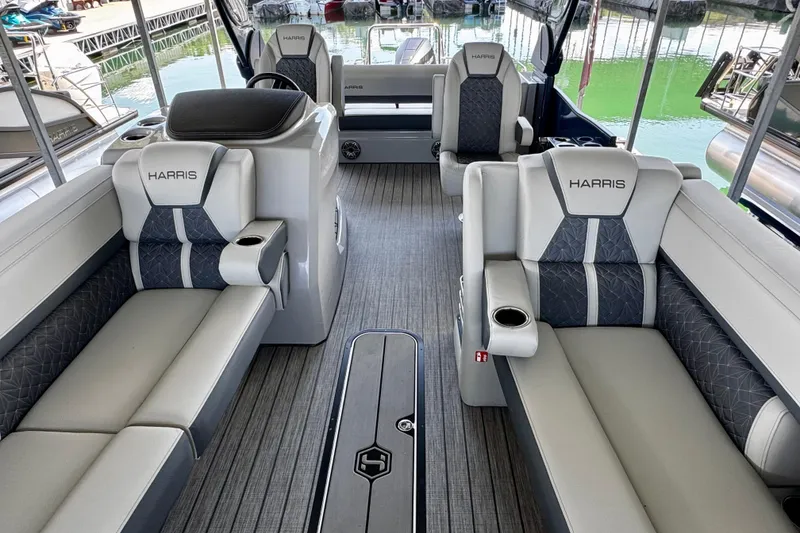 Slide: The Image of 2026 Harris Grand Mariner 250 SLDH interior with luxurious seating and modern design. - 12