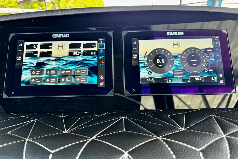 Slide: The Image of Simrad displays on 2026 Harris Grand Mariner 250 SLDH, showcasing navigation and system controls. - 17