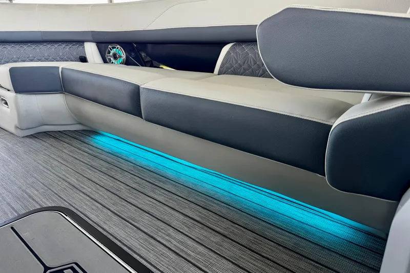 Slide: The Image of Luxurious seating with ambient lighting on 2026 Harris Grand Mariner 250 SLDH boat. - 21