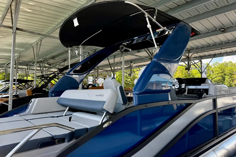 Slide: The Image of 2026 Harris Grand Mariner 250 SLDH pontoon boat under covered dock. - 7
