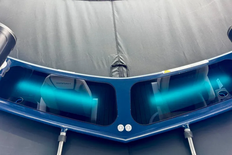 Slide: The Image of 2026 Harris Grand Mariner 250 SLDH boat interior with sleek design and modern seating. - 19