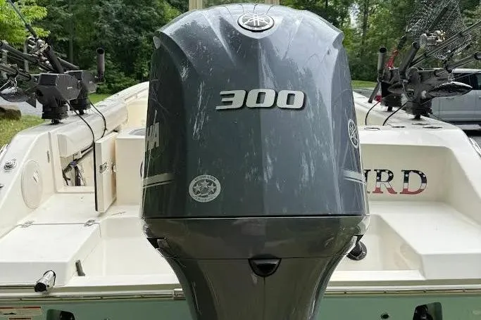 Slide: The Image of 2020 Cobia 240 Center Console boat with Yamaha 300 outboard motor, rear view. - 8
