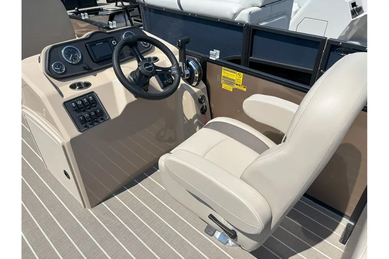 Slide: The Image of Helm of a Bentley Pontoons FISH 200 CW with beige seat and dashboard. - 5