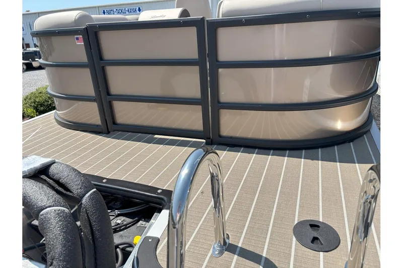 Slide: The Image of The image shows the deck of a 2026 Bentley Pontoons FISH 200 CW with sleek details. - 22