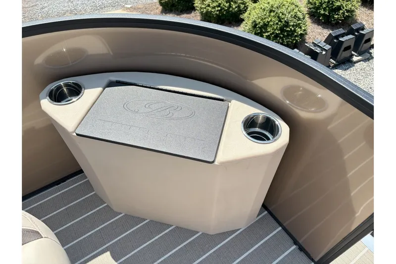 Slide: The Image of A sleek cup holder with Bentley logo on a pontoon boat. - 15