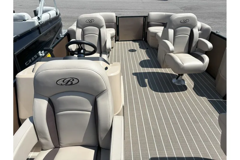 Slide: The Image of Interior of a Bentley Pontoons FISH 200 CW with beige seating. - 4