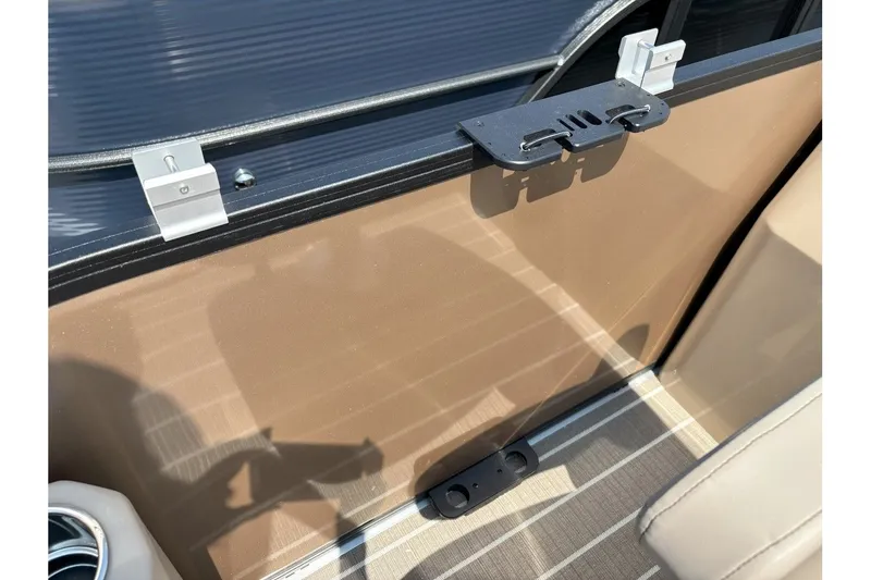 Slide: The Image of Close-up of a boat deck with brown paneling and metal fittings. - 13