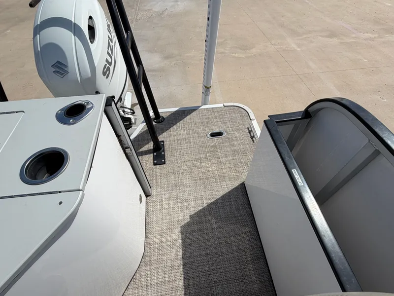 Slide: The Image of View of a SilverWave 2410 RLP SW3 boat deck with Suzuki engine. - 34