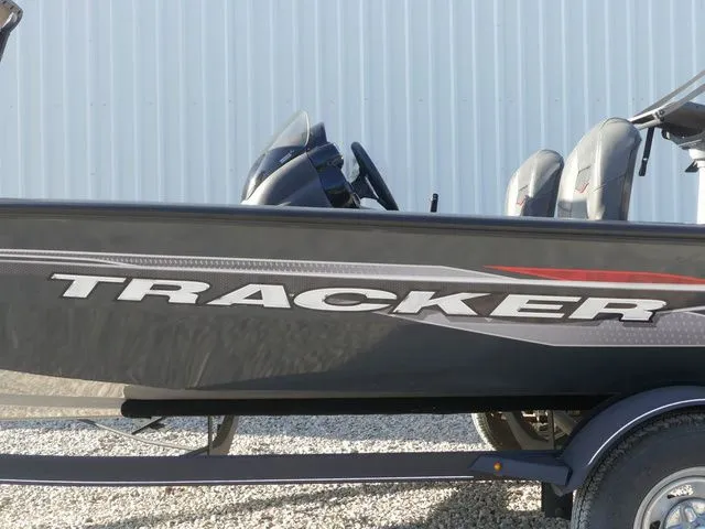 Slide: The Image of Side view of a Tracker Pro Team 175 TF boat on a trailer. - 8