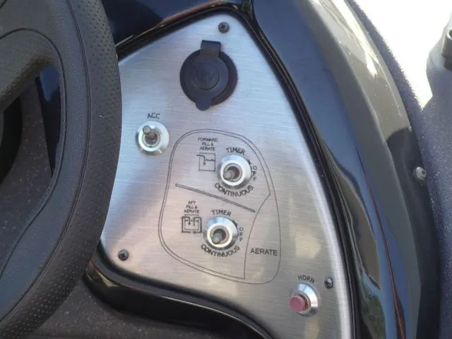 Slide: The Image of Close-up of a control panel with switches and sockets. - 36