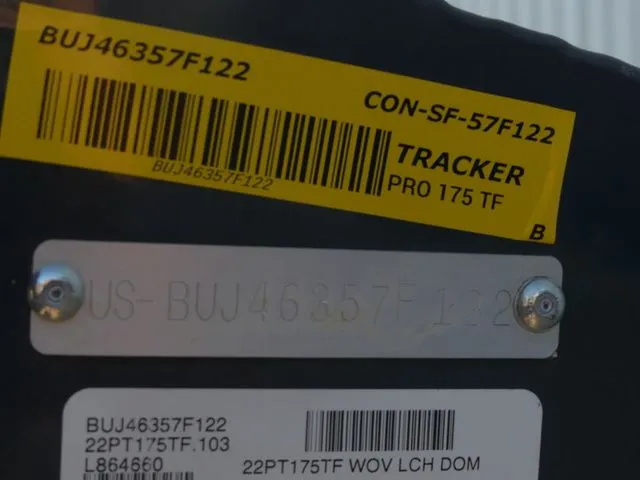Slide: The Image of Close-up of serial numbers and labels on a Tracker Pro Team 175 TF boat. - 7