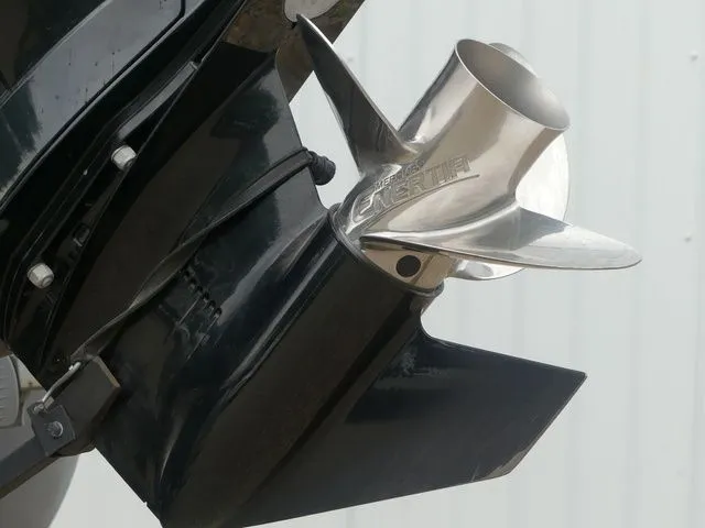 Slide: The Image of Close-up of a boat propeller on an outboard motor. - 17