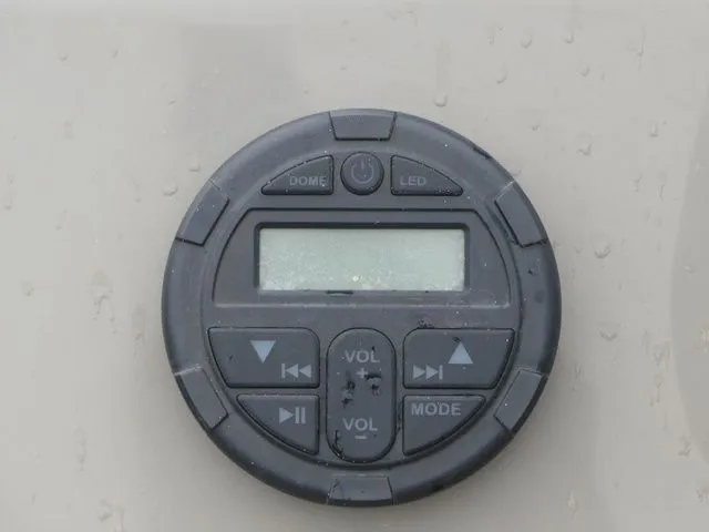 Slide: The Image of Round control panel with display and buttons for volume and mode. - 41