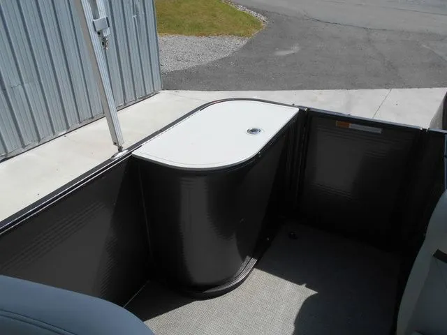 Slide: The Image of The image shows a boat interior with a white countertop and gray walls. - 11