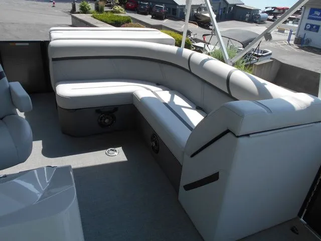Slide: The Image of The image shows a luxurious, cushioned seating area on a boat. - 12