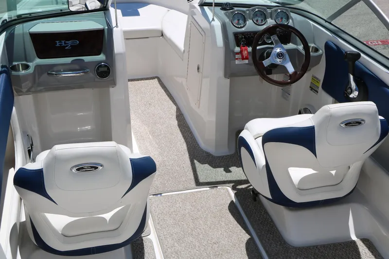 Slide: The Image of Interior of 2013 Chaparral 19 Sport H2O boat with steering wheel and seating. - 8