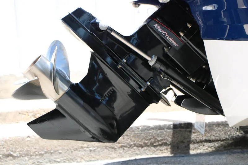 Slide: The Image of Close-up of a 2013 Chaparral 19 Sport H2O boat's MerCruiser outboard motor. - 34