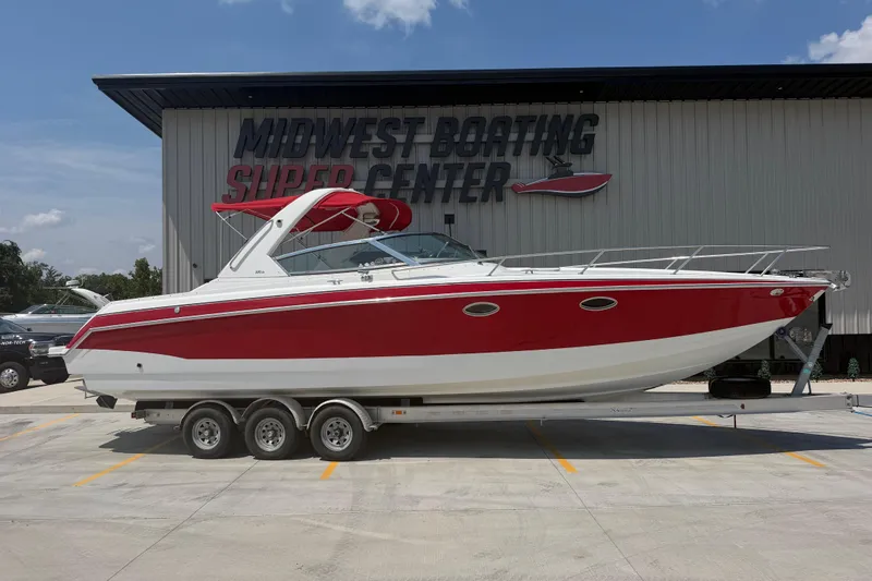 The Image of 2006 Formula 330 Sun Sport boat in red and white at Midwest Boating Super Center. - 1