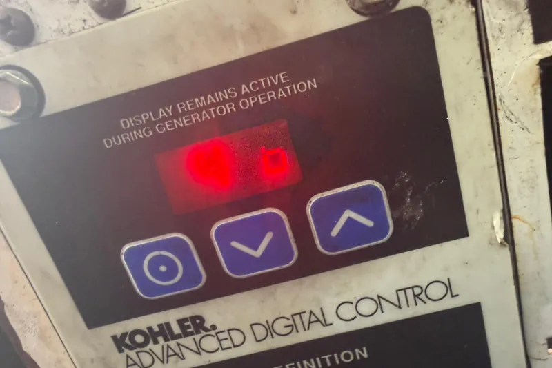 Slide: The Image of Kohler advanced digital control panel with active display on a 2006 Formula 330 Sun Sport. - 26