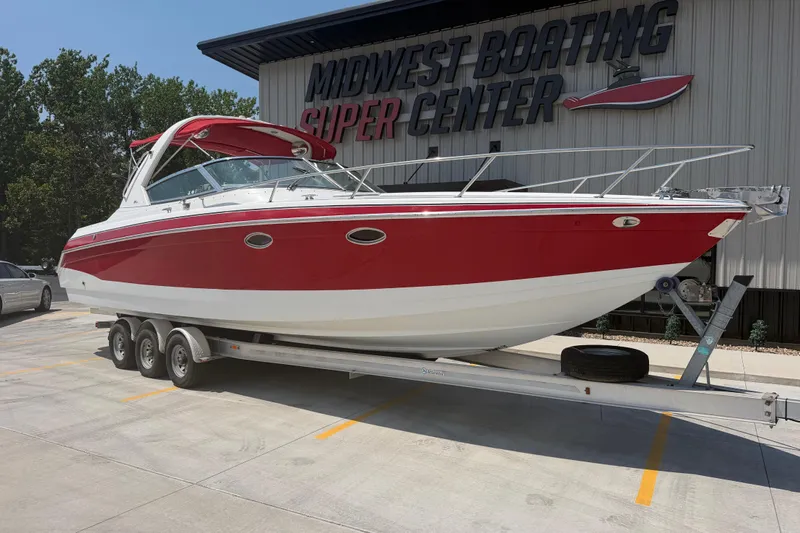 Slide: The Image of 2006 Formula 330 Sun Sport boat on trailer at Midwest Boating Super Center. - 2