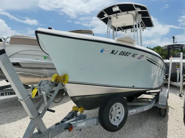 Slide: The Image of A 2010 May-Craft 1900 boat on a trailer, ready for use. - 3