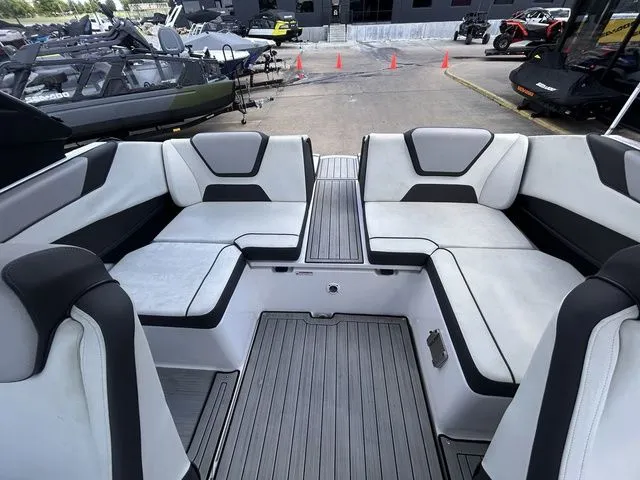 Slide: The Image of The image shows the cockpit of a Yamaha 222SE boat with gray and black seating. - 16