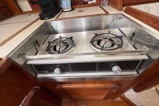 Slide: The Image of Stainless steel stove in 1990 Island Packet 27 yacht kitchen. - 24