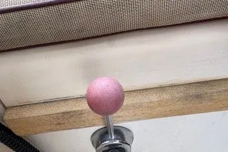Slide: The Image of Pink throttle lever on a 1990 Island Packet 27 sailboat. - 52