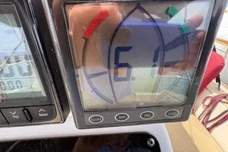 Slide: The Image of Close-up of a 1990 Island Packet 27 sailboat's navigation display showing speed. - 14