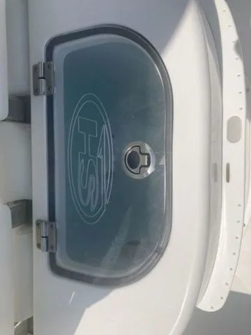 Slide: The Image of Close-up of a hatch latch on a 2016 Sea Hunt Gamefish 25 boat. - 7