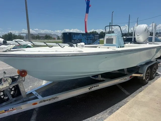 Slide: The Image of A 2027 Hewes Redfisher 21 on a trailer, ready for the water. - 8