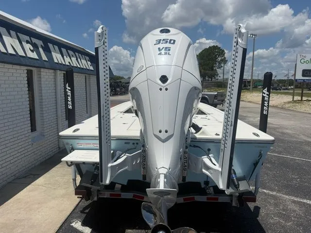 Slide: The Image of Rear view of a Hewes Redfisher 21 boat with a 350 HP V6 outboard motor. - 5