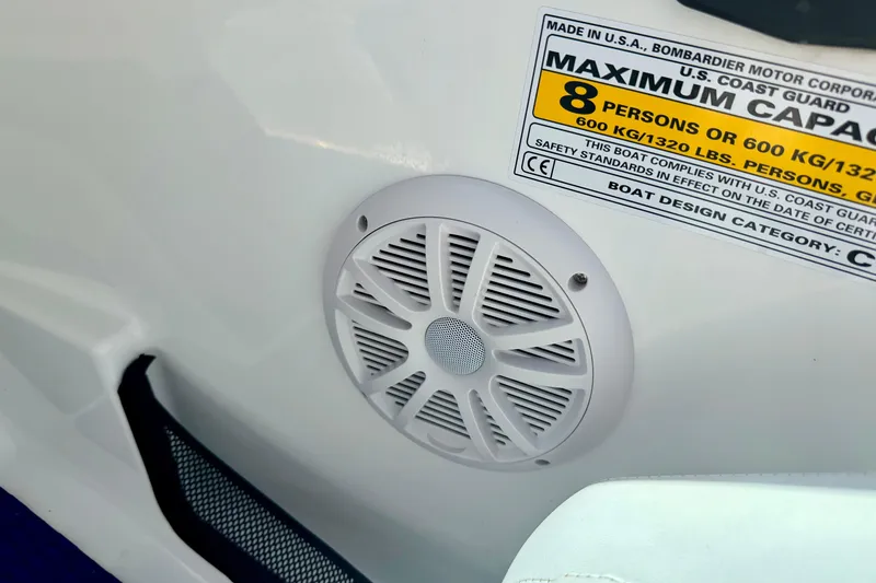 Slide: The Image of 2004 Bombardier SEADOO Utopia 185 boat speaker and capacity label detail. - 33