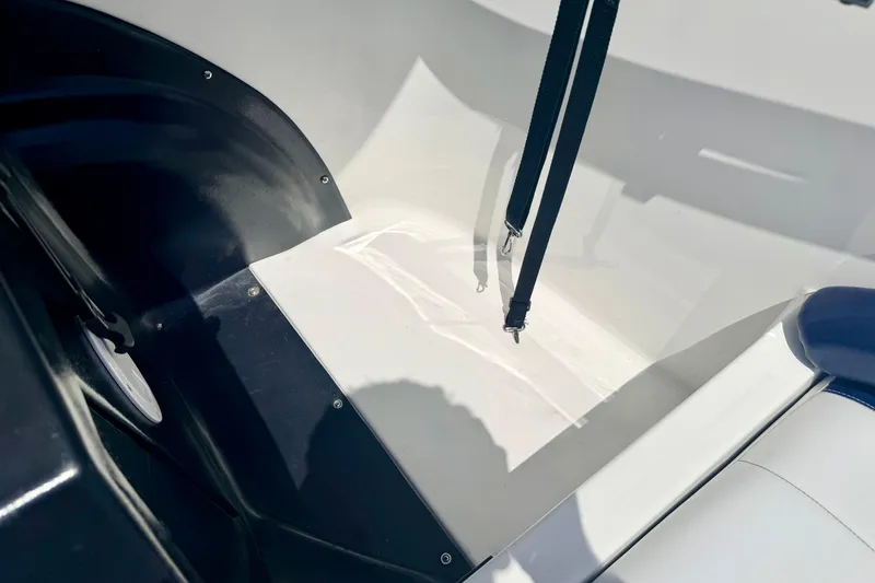 Slide: The Image of Interior view of a 2004 Bombardier SEADOO Utopia 185 boat, featuring seating and straps. - 43