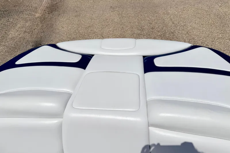 Slide: The Image of 2004 Bombardier SEADOO Utopia 185 boat seat with white and blue upholstery. - 16