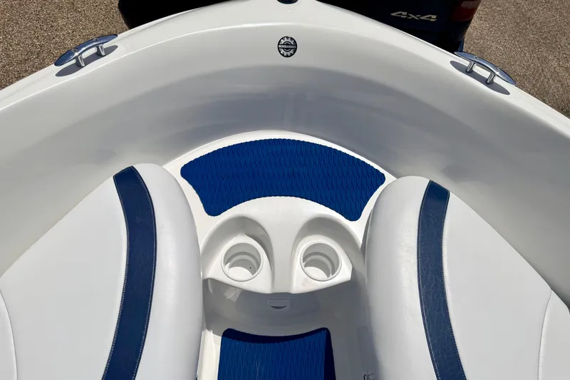 Slide: The Image of 2004 Bombardier SEADOO Utopia 185 boat interior with blue and white seating. - 39