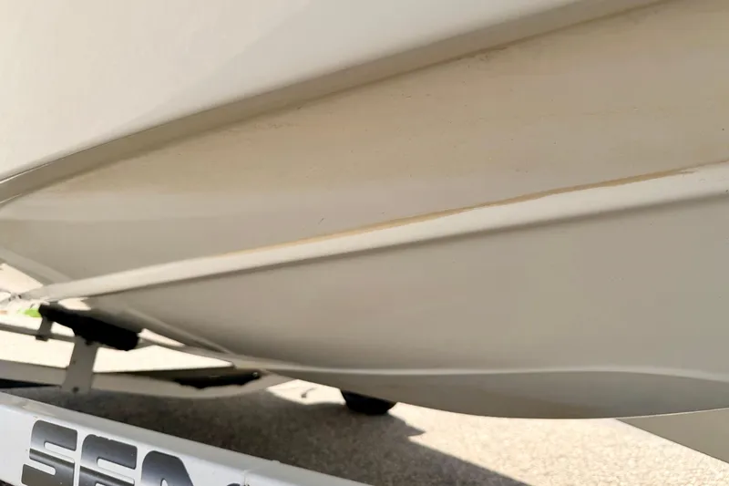 Slide: The Image of Close-up of 2004 Bombardier SEADOO Utopia 185 boat hull on trailer. - 55