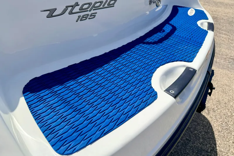 Slide: The Image of 2004 Bombardier SEADOO Utopia 185 boat with blue non-slip deck mat. - 15