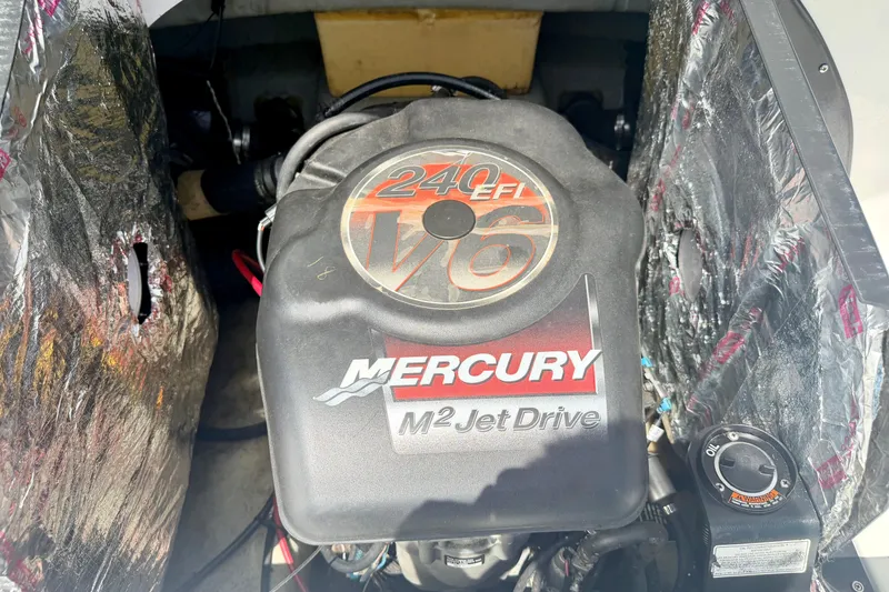 Slide: The Image of Mercury M2 Jet Drive engine in a 2004 Bombardier SEADOO Utopia 185 boat. - 14