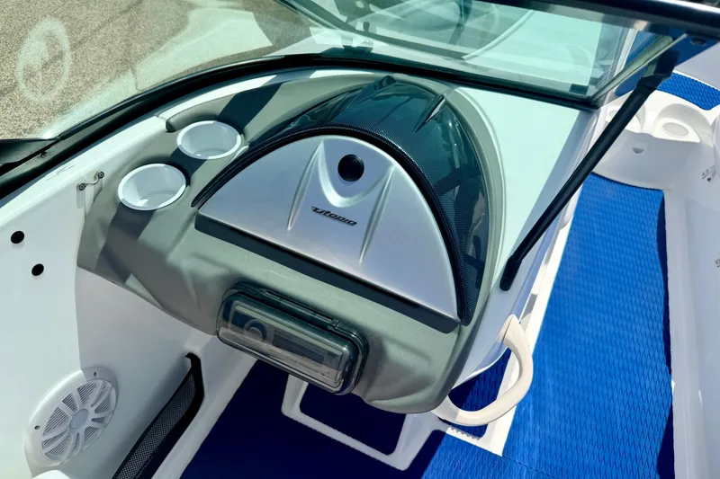 Slide: The Image of 2004 Bombardier SEADOO Utopia 185 dashboard with cup holders and speaker. - 26