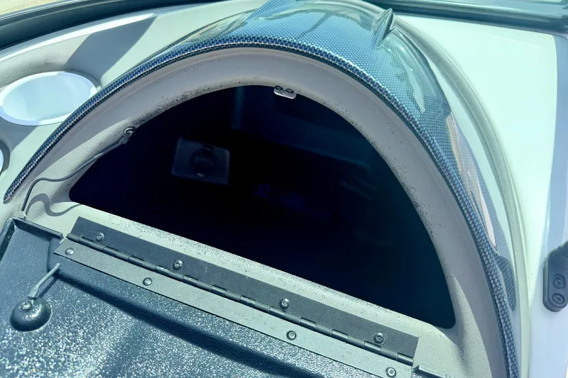 Slide: The Image of 2004 Bombardier SEADOO Utopia 185 boat interior storage compartment detail. - 29