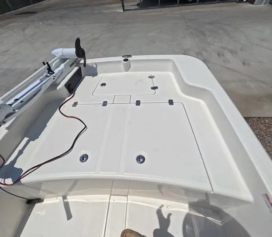 Slide: The Image of The image shows the deck of a 2023 Mako Pro Skiff 15 CC boat. - 19