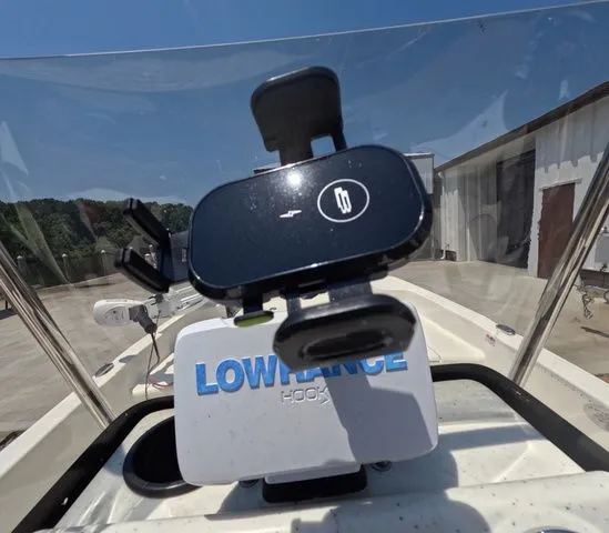 Slide: The Image of Close-up of boat accessories with Lowrance device and phone holder. - 16